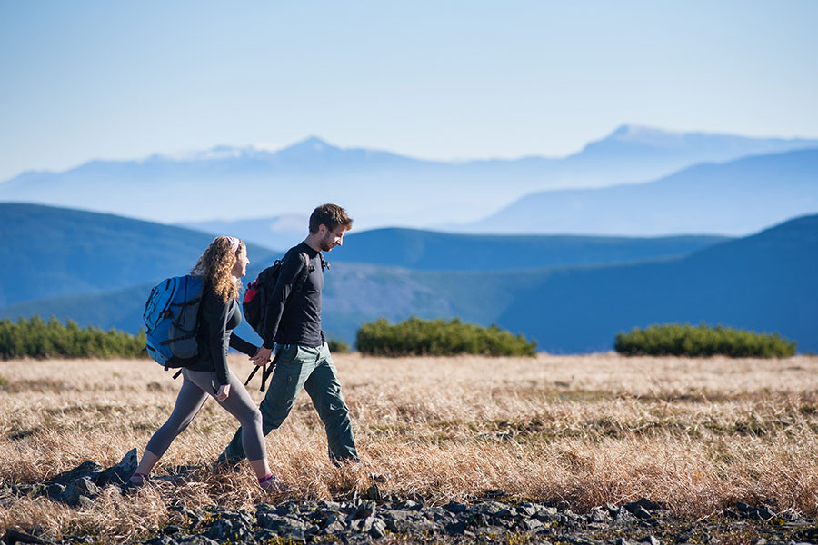 a couple hiking in the mountains of Colorado